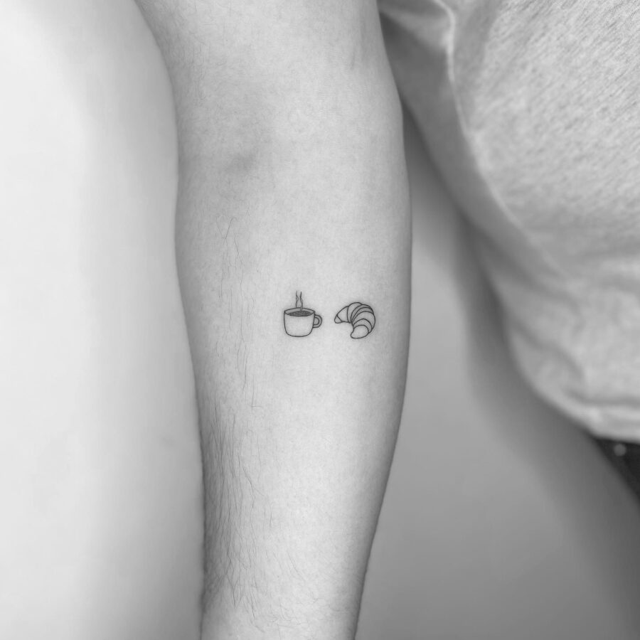 Minimalist Croissant and Coffee Tattoo Design Tattoo on skin