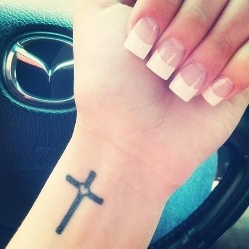 cross necklace tattoo Tattoo on skin