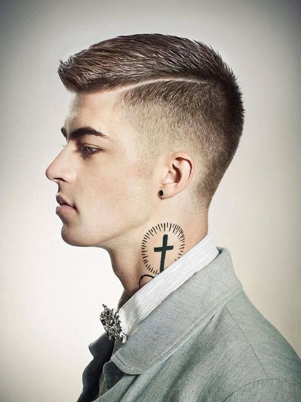 small cross tattoo Tattoo on skin