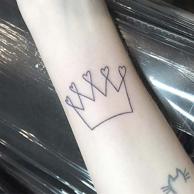 Cartoonish Crown with Heartshaped Peaks Tattoo Design Tattoo on skin