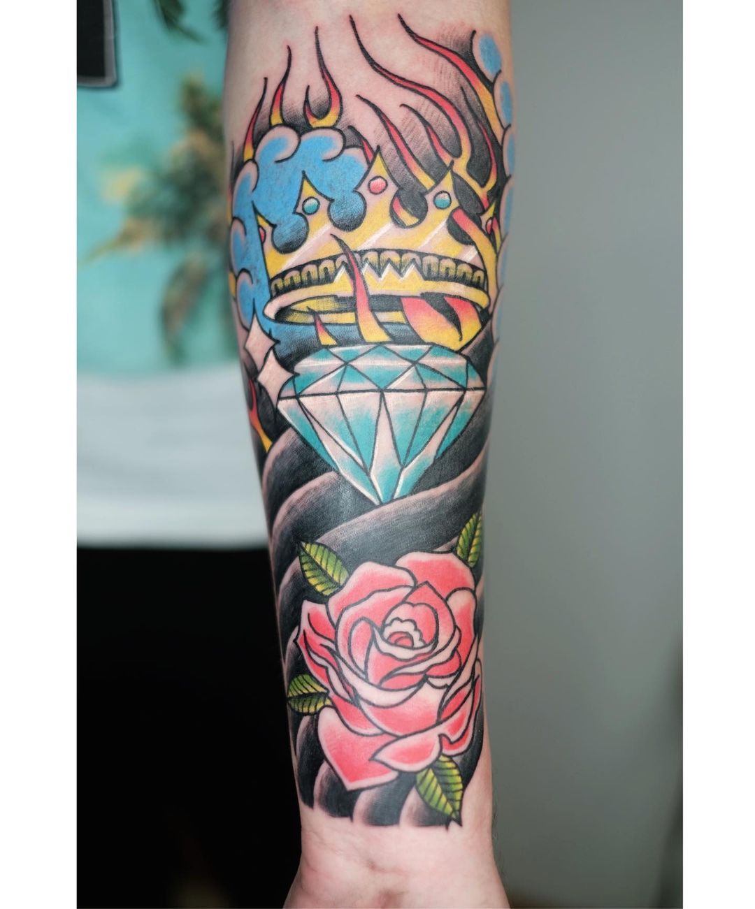 Crown and Jewel Sleeve with Old School Accents Tattoo on skin