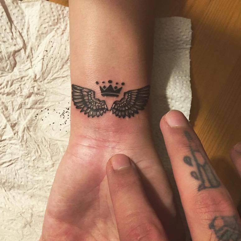 Crown with Wings Wrist Tattoo Art Tattoo on skin