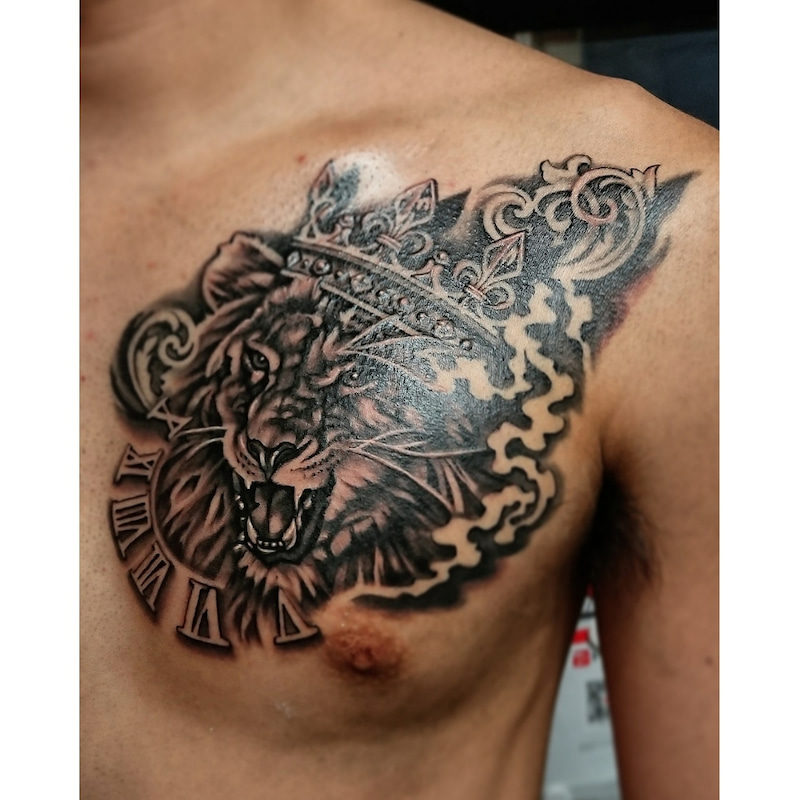 Lion King Ink with Roman Numerals Crown Chest Tattoo Tattoo on skin