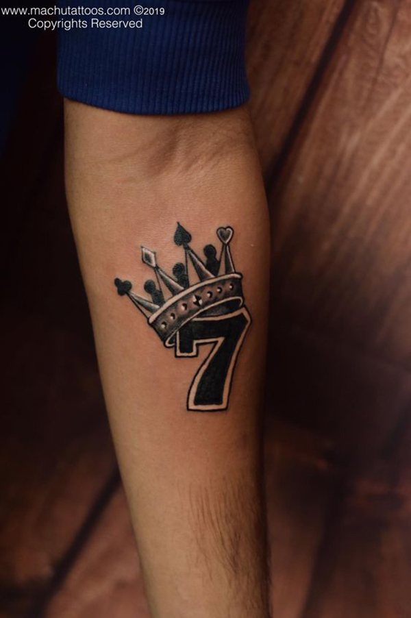 Lucky Seven Tattoo with Card Suits Tattoo on skin