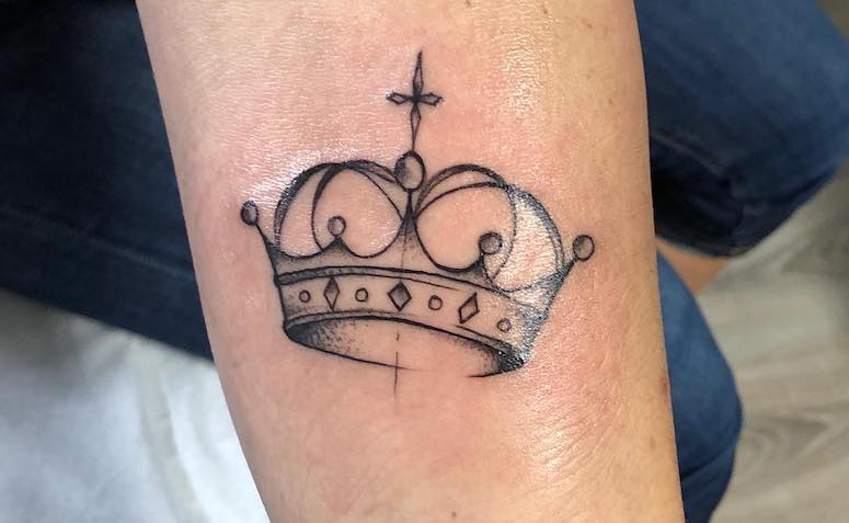 Simple, Sophisticated Crown Body Art Tattoo on skin