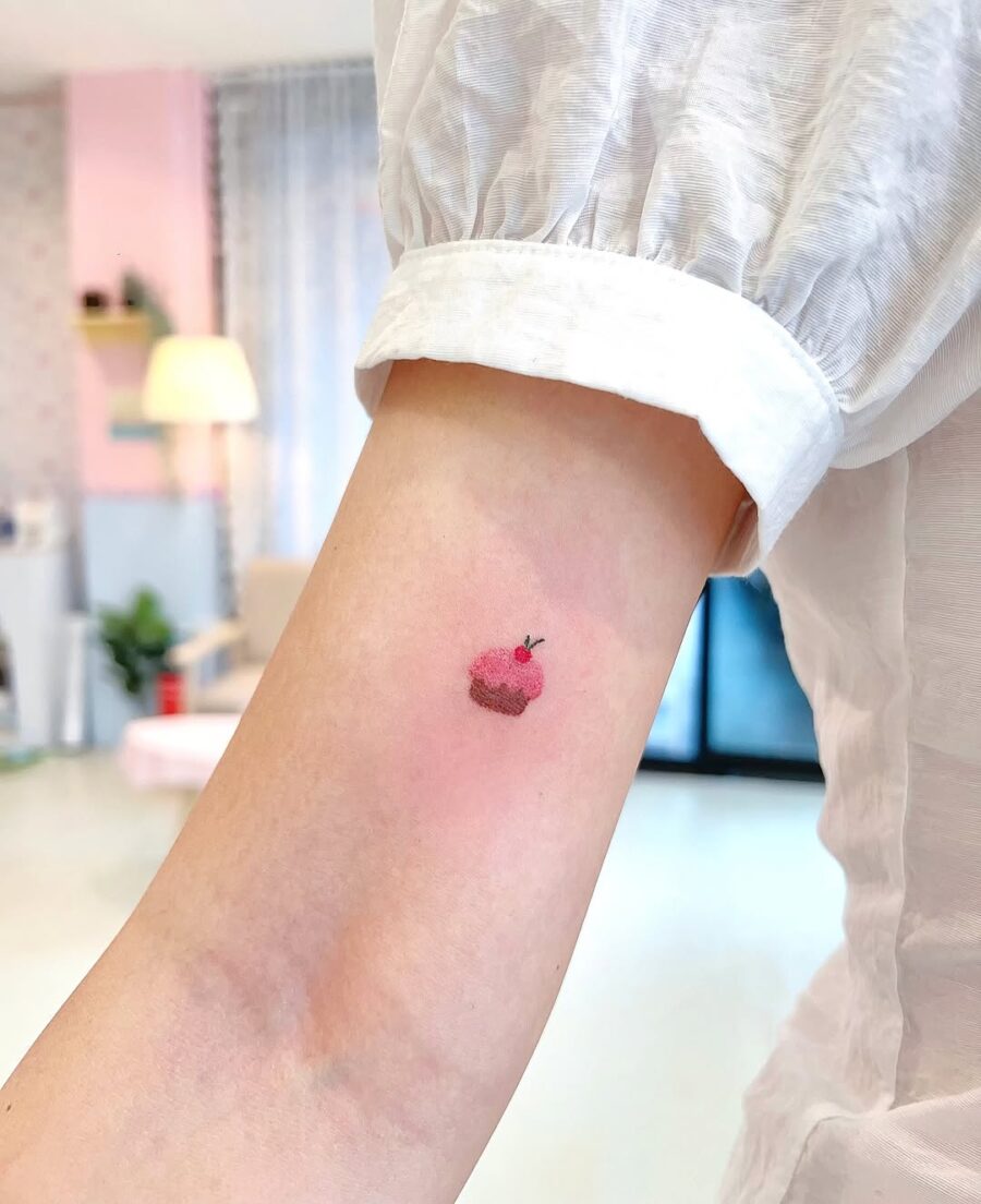 Charming Delicate Cupcake Tattoo Design Tattoo on skin