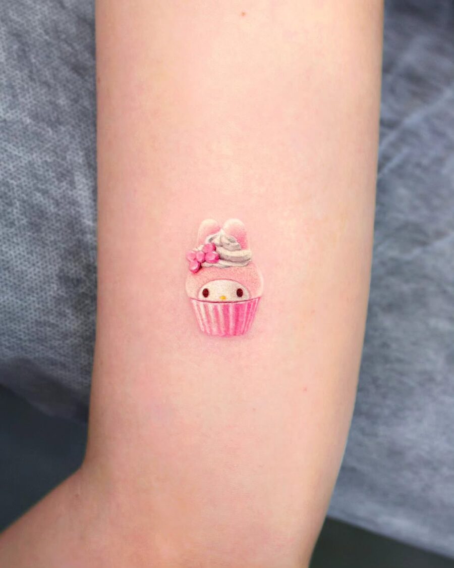 Charming pastel cupcake tattoo with adorable details Tattoo on skin