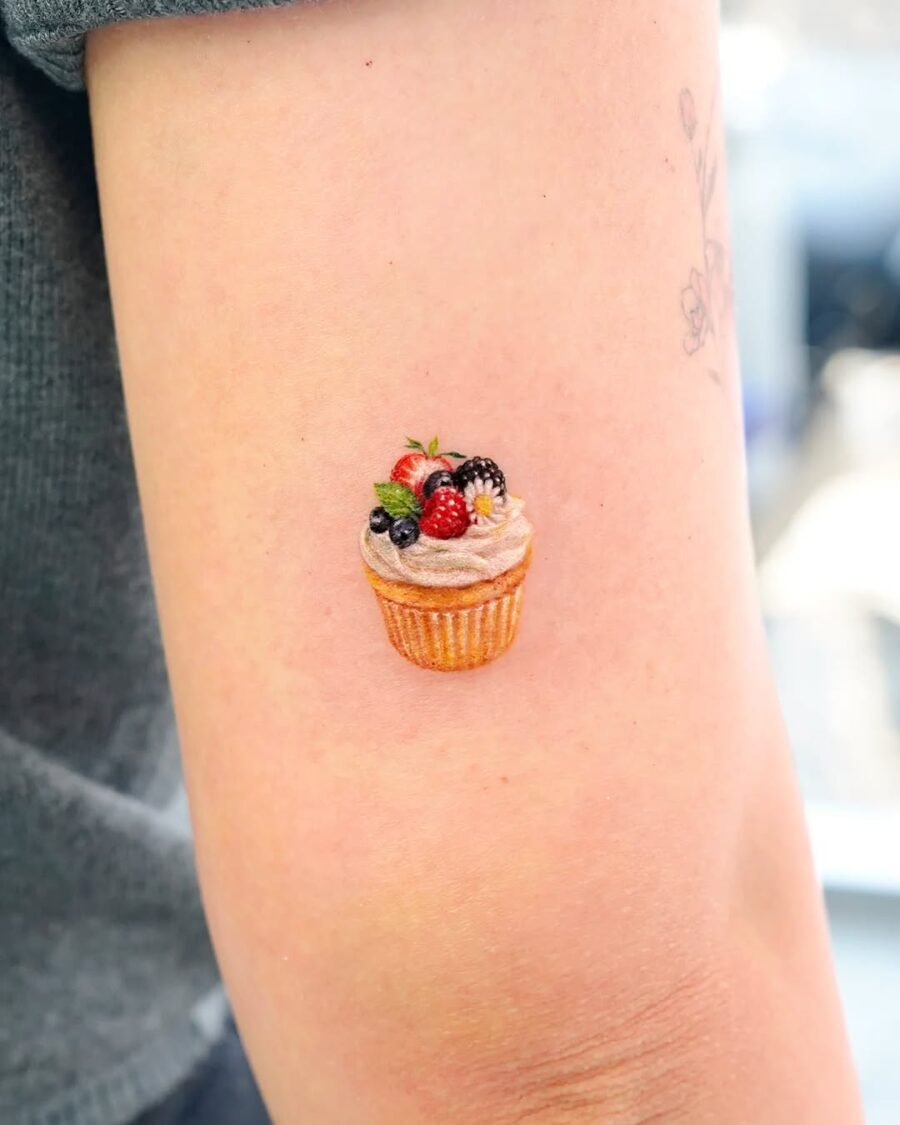 Delightful cupcake tattoo brings sweetness to skin Tattoo on skin