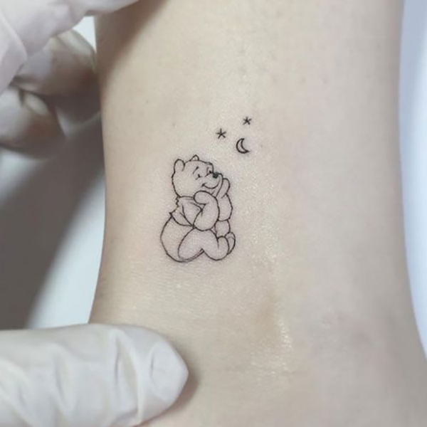 In Celebration of Winnie the Pooh Small Tattoos Tattoo on skin