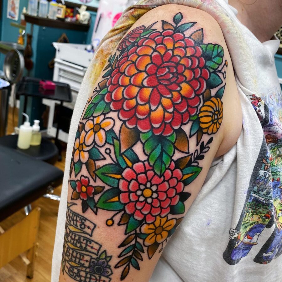 Bold and colorful dahlia tattoo design inspiration Tattoo on skin
