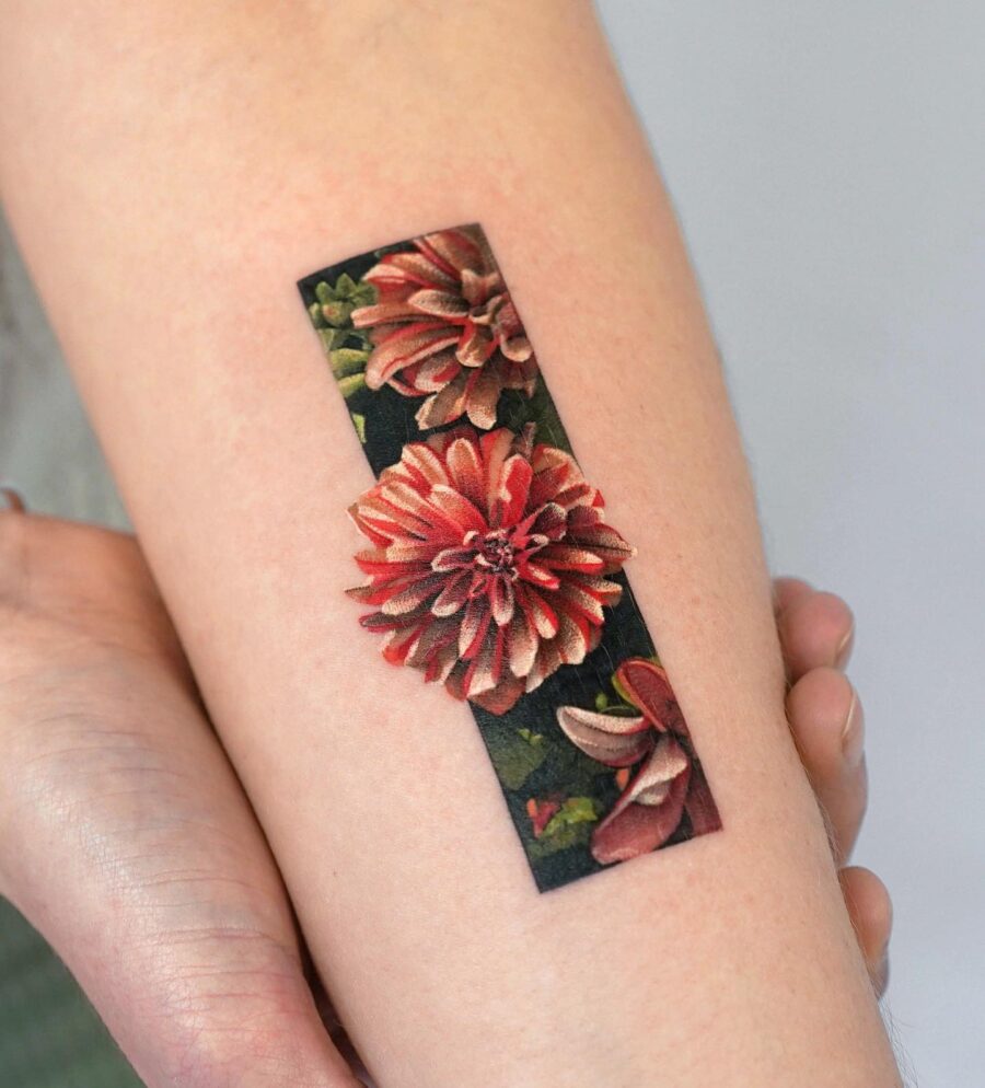 Stunning dahlia tattoo on the forearm Tattoo on skin