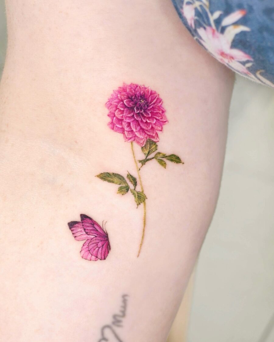 Stunning dahlia tattoo with a butterfly companion Tattoo on skin