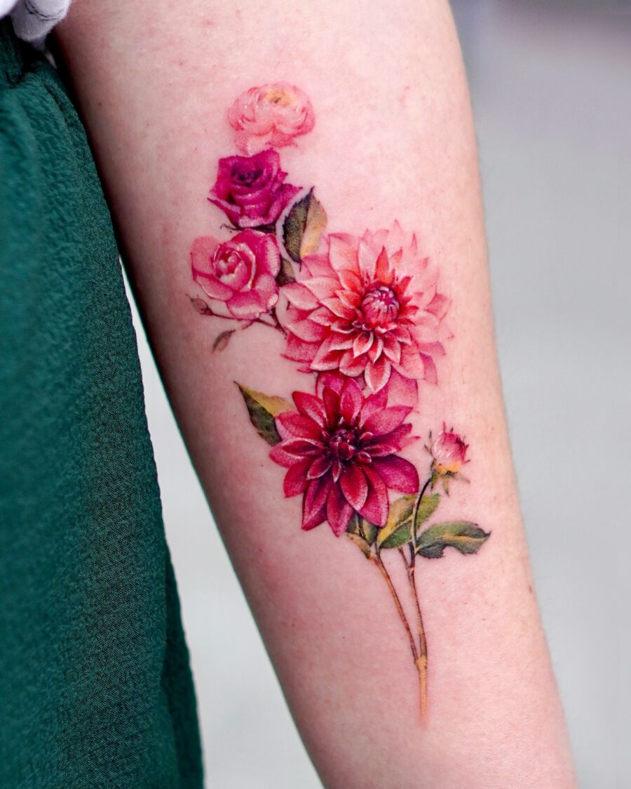 Stunning floral dahlia tattoo in vibrant colors Tattoo on skin