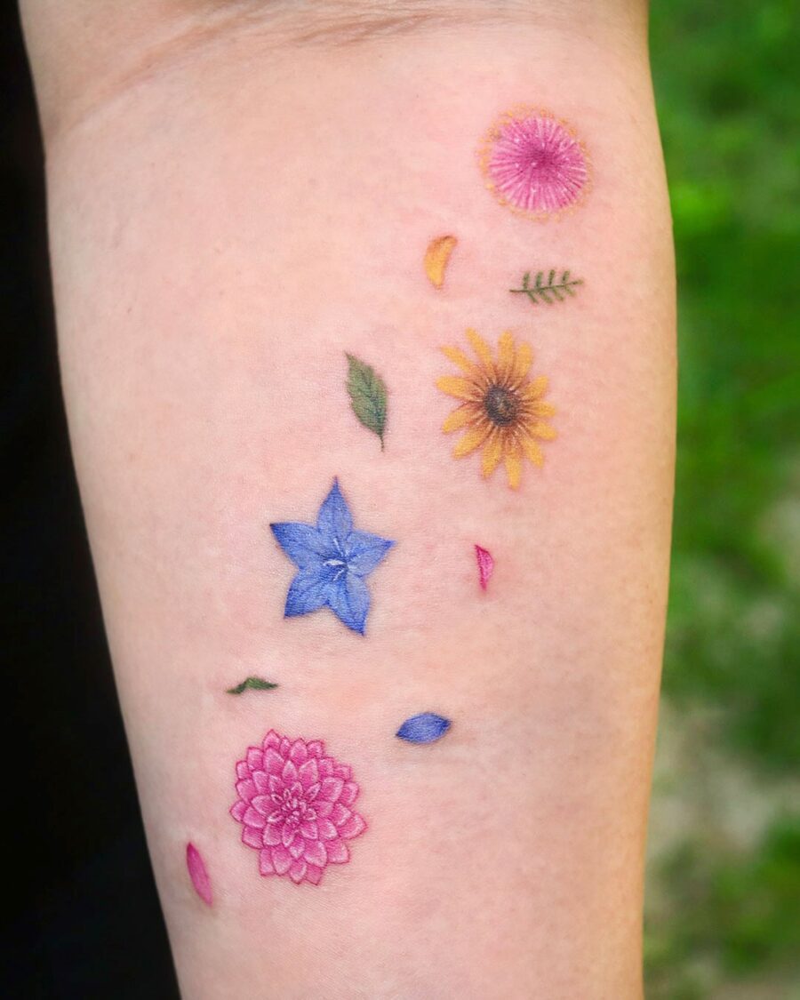 Vibrant and Playful Dahlia Flower Tattoo Design Tattoo on skin