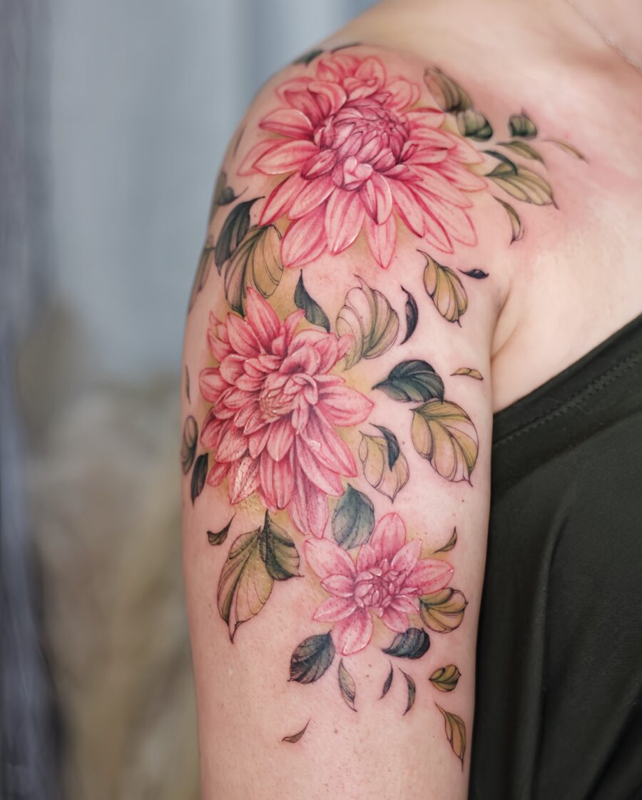 Vibrant dahlia tattoo blooming on shoulder Tattoo on skin