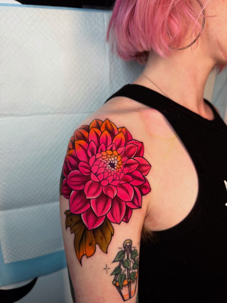 Vibrant pink dahlia tattoo on shoulder Tattoo on skin