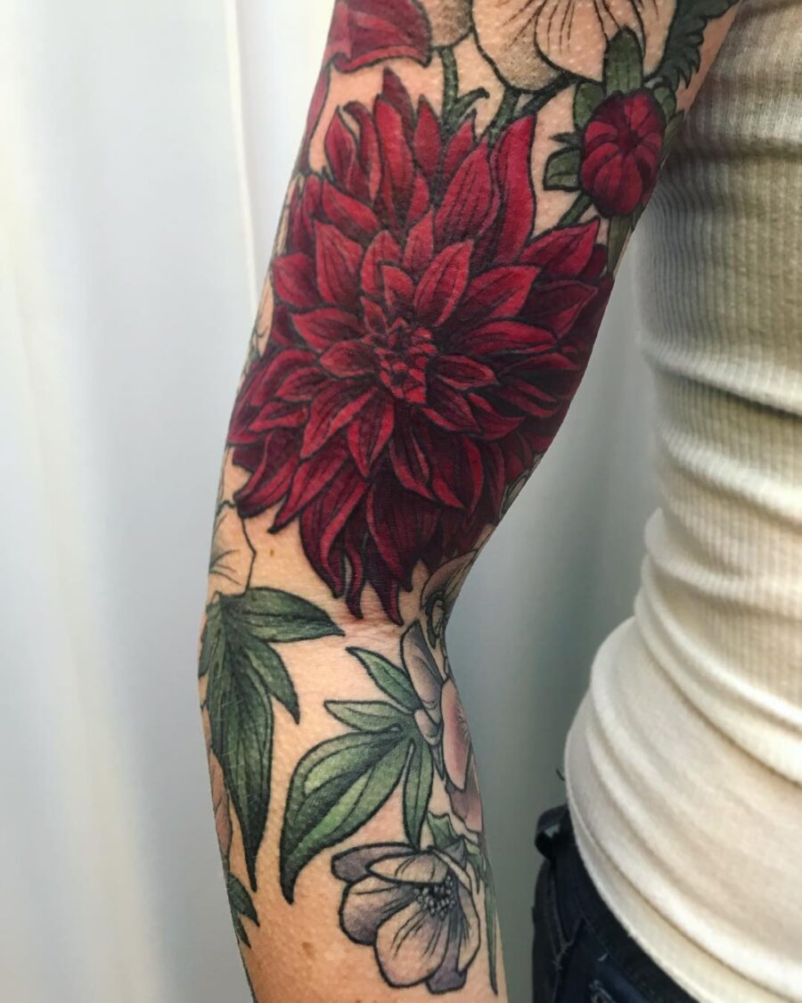 Vibrant Red Dahlia on Forearm Art Tattoo on skin