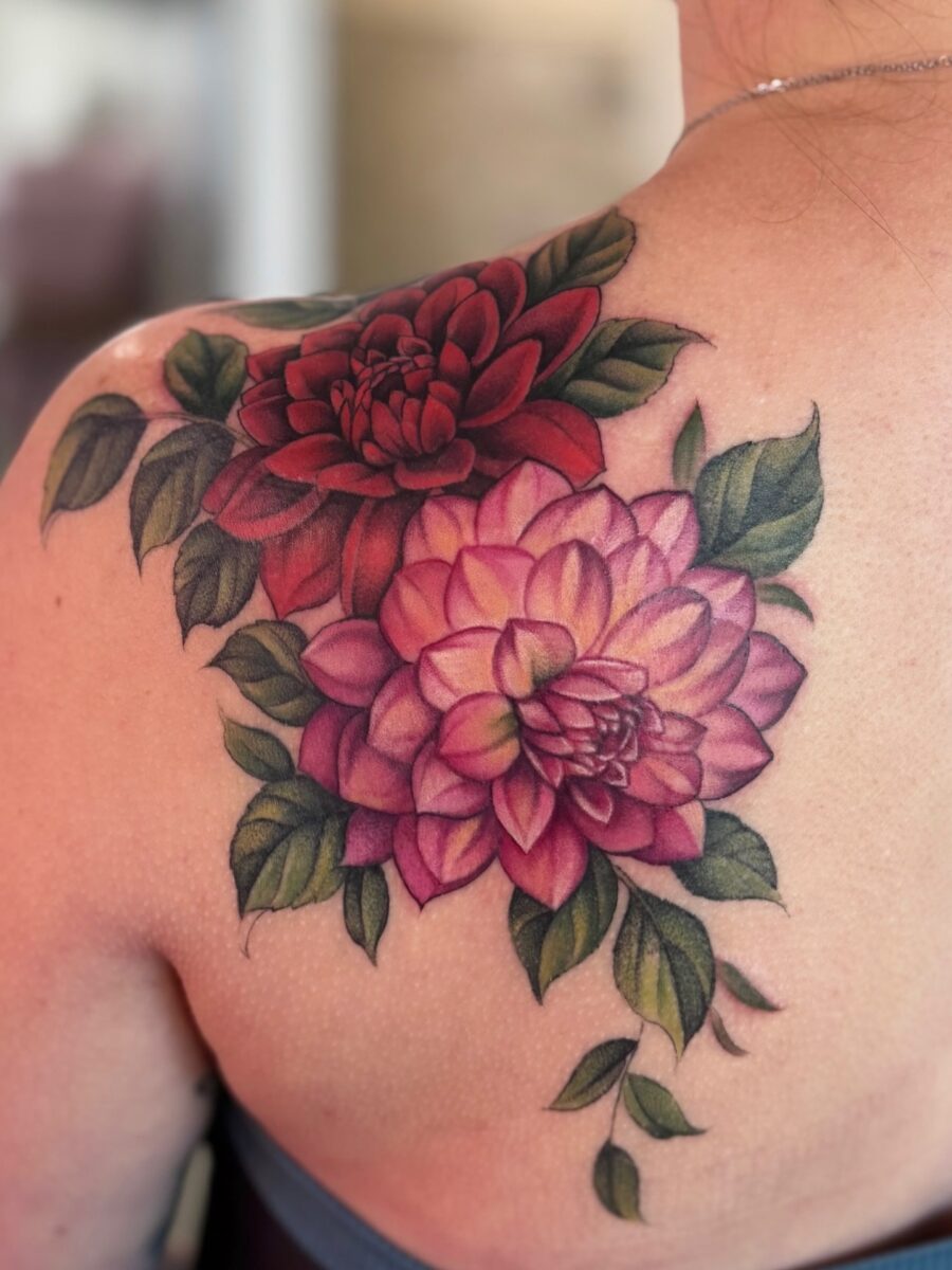 Vividly colored dahlia tattoos blooming on skin Tattoo on skin
