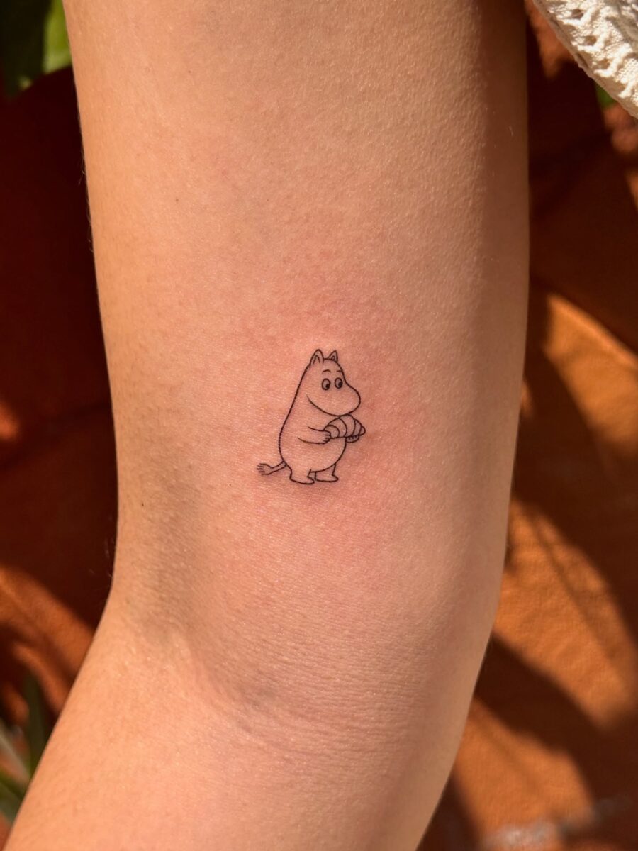 Charming Moomin Tattoo on the Arm dainty tattoos