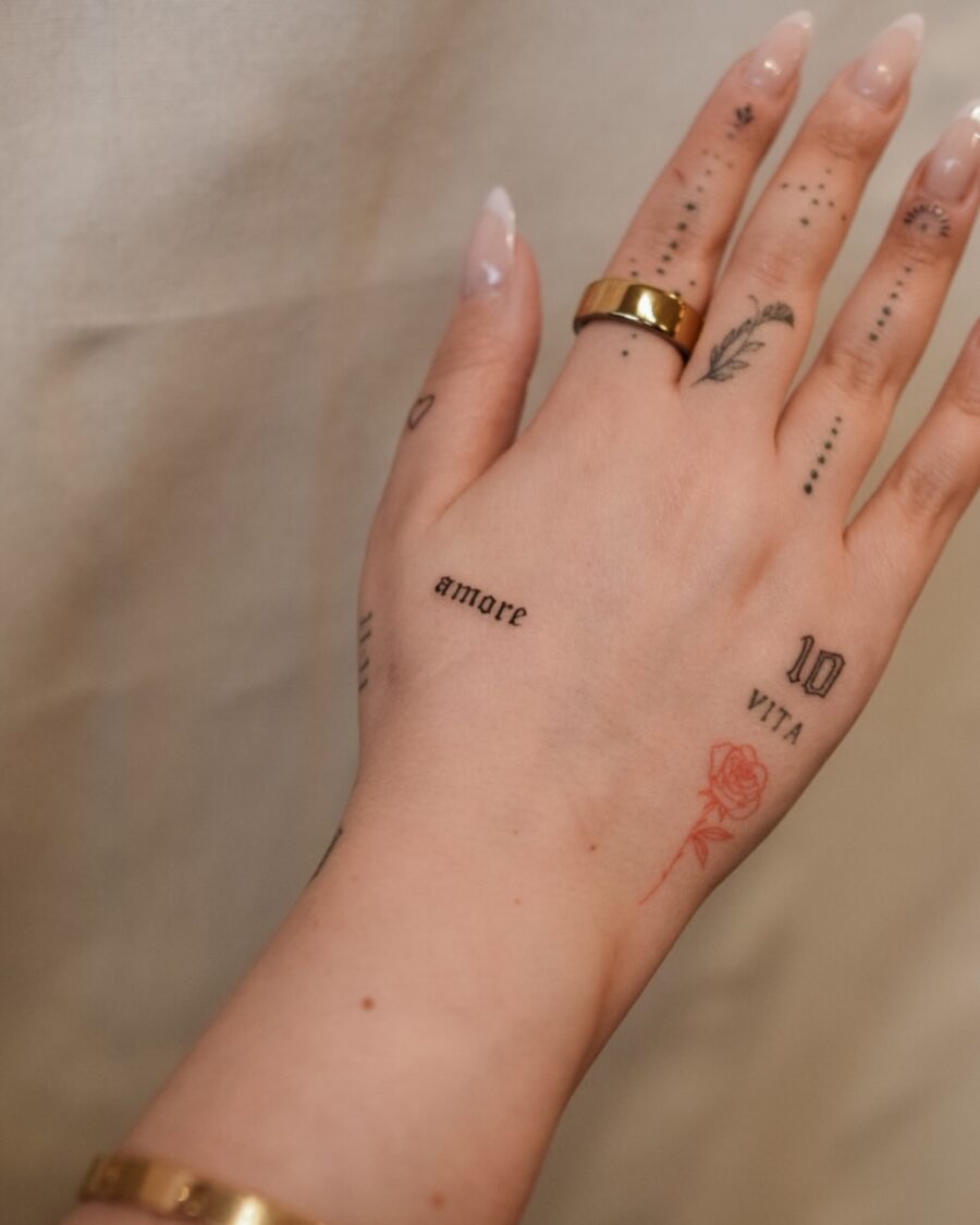 Chic dainty tattoos accentuating delicate hands Tattoo on skin