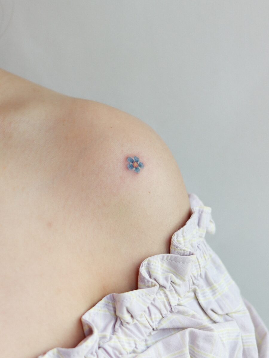 Delicate floral design on the shoulder Tattoo on skin