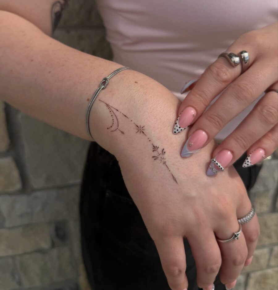 Elegant celestial designs on delicate skin Tattoo on skin