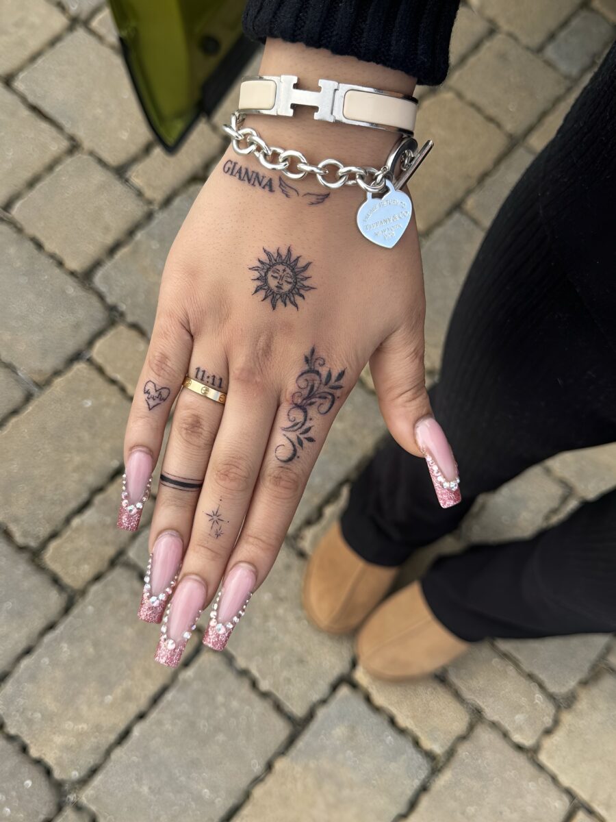 Elegant Dainty Tattoos on a Handsome Hand Tattoo on skin