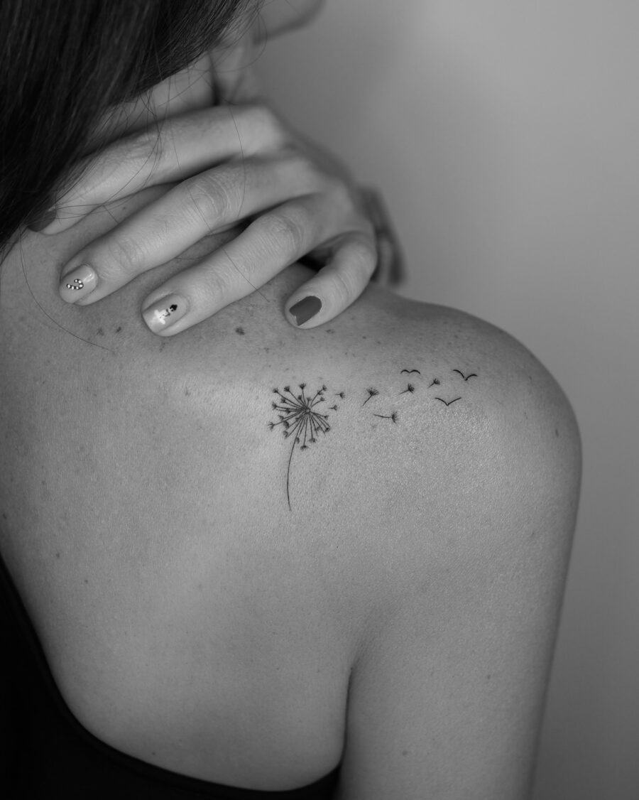 Elegant dandelion tattoo with flying birds Tattoo on skin