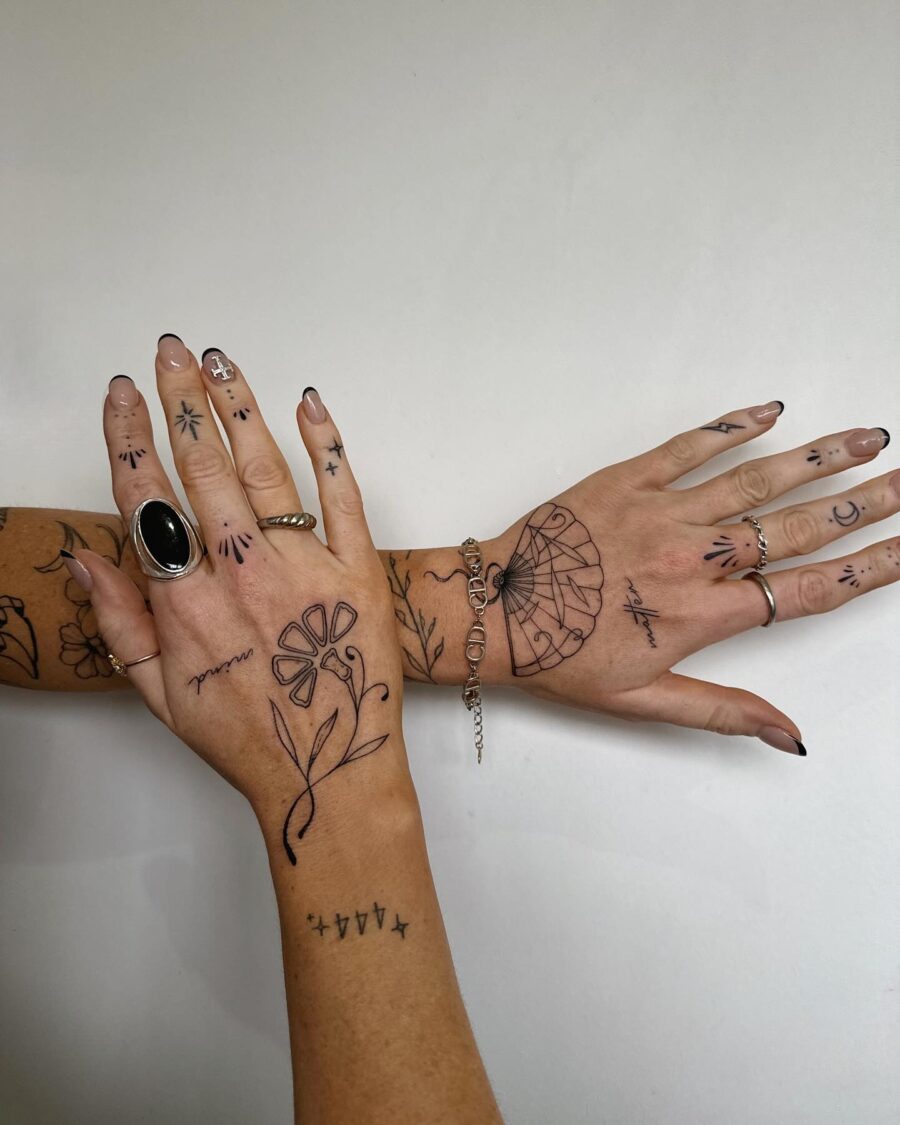 Elegant display of dainty hand tattoos Tattoo on skin