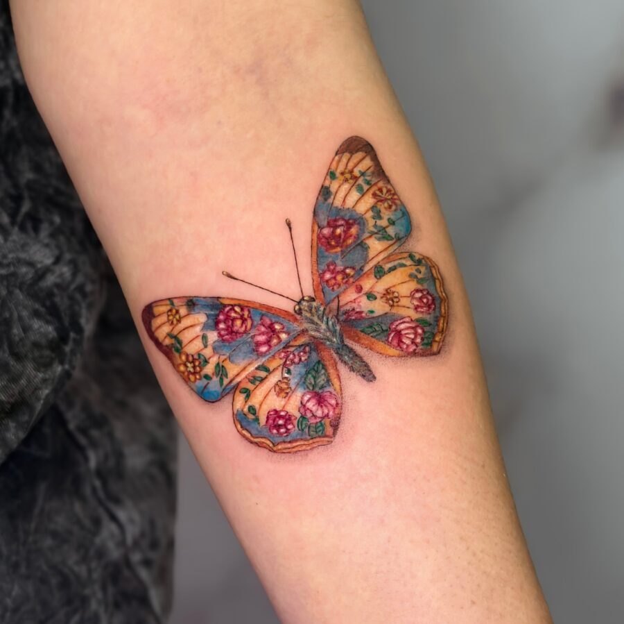 Floral-Patterned Butterfly Tattoo Design Tattoo on skin