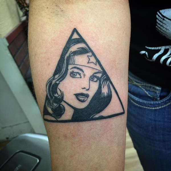 Black and White Super Woman Triangle Tattoo Tattoo on skin