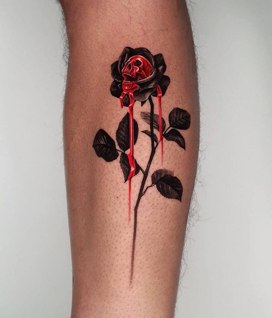 Dark elegance of a skull rose tattoo Tattoo on skin