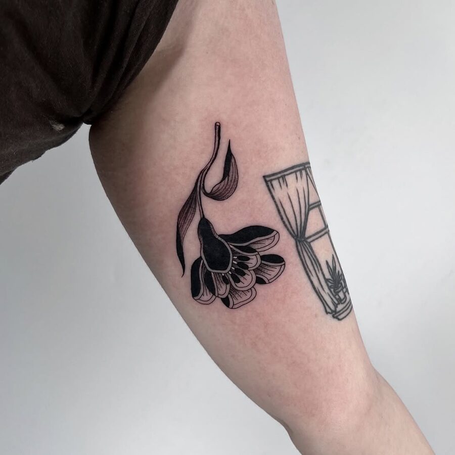 Elegant dead flower tattoo showcasing delicate details Tattoo on skin