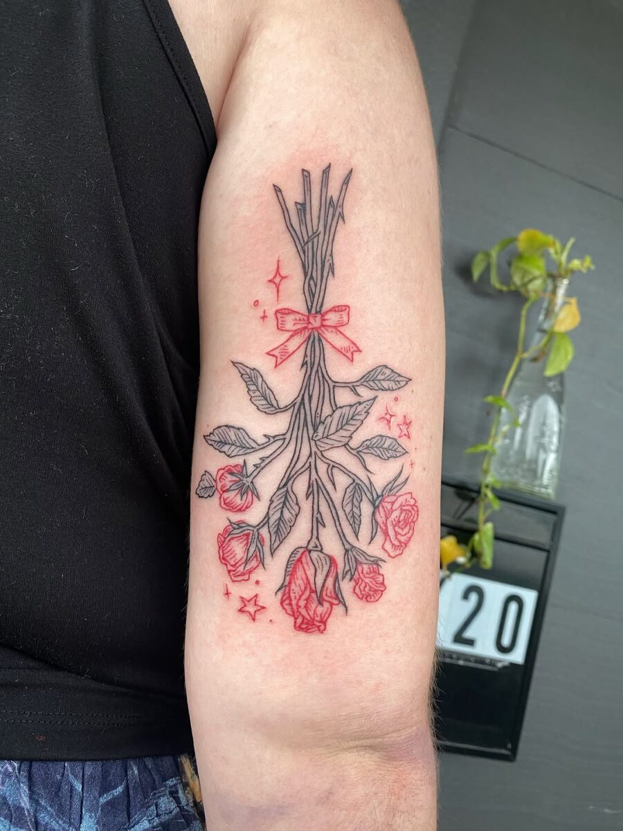 Elegant dead flower tattoo with vibrant details Tattoo on skin