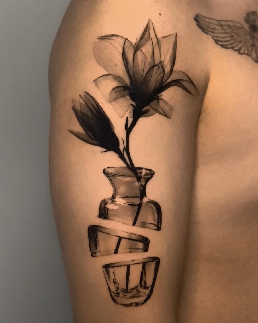Elegant dead flower with vase tattoo design Tattoo on skin