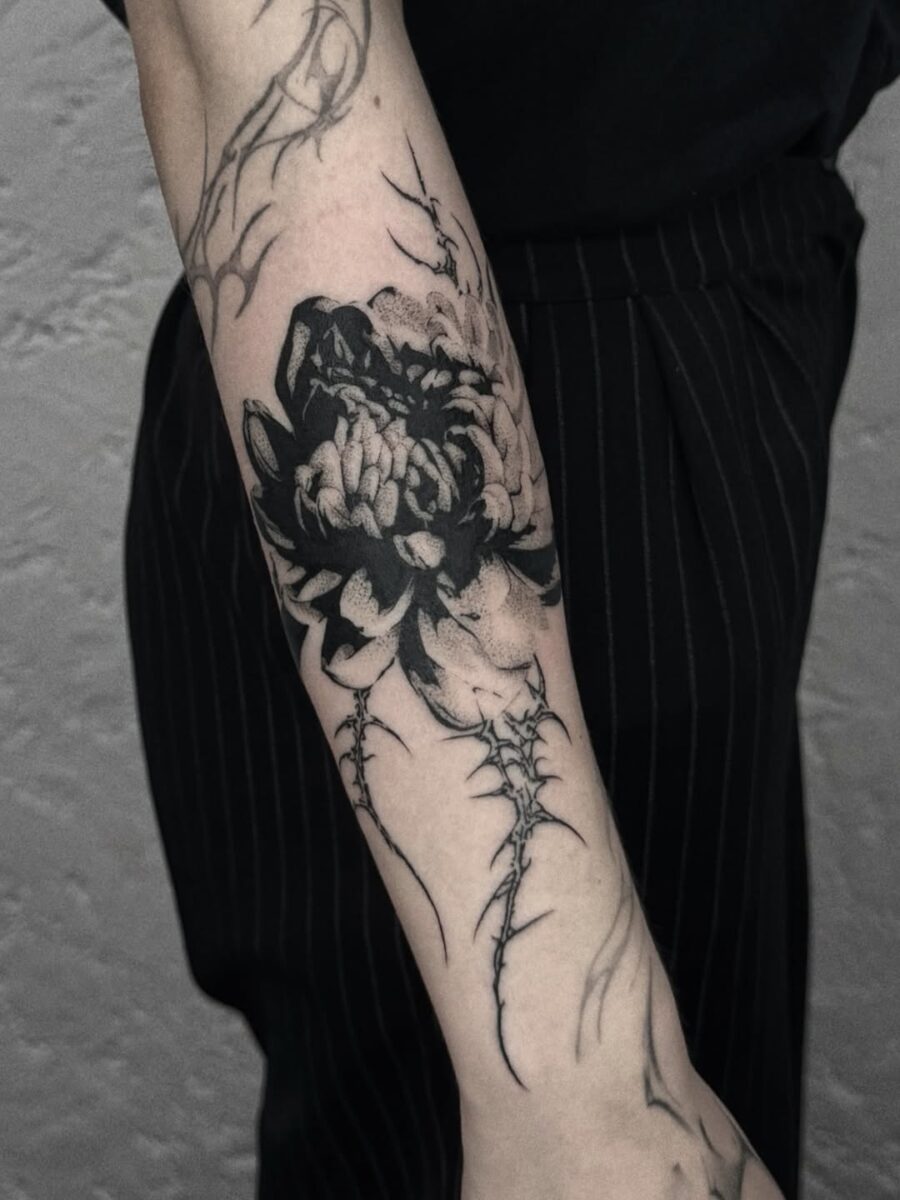 Intricate blackwork dead flower tattoo design Tattoo on skin