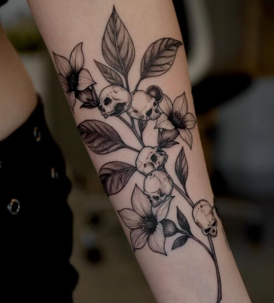 Intricate dead flower and skull tattoo design Tattoo on skin
