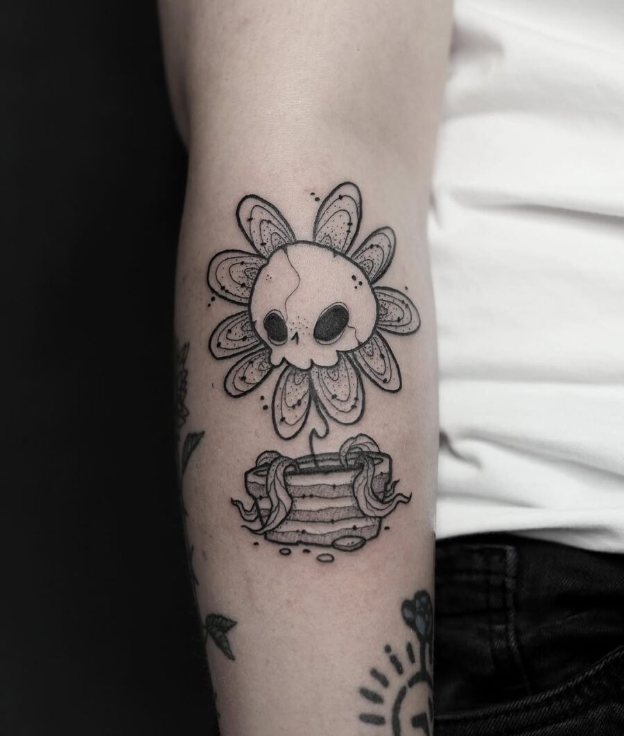Unique skull flower tattoo with layered details Tattoo on skin