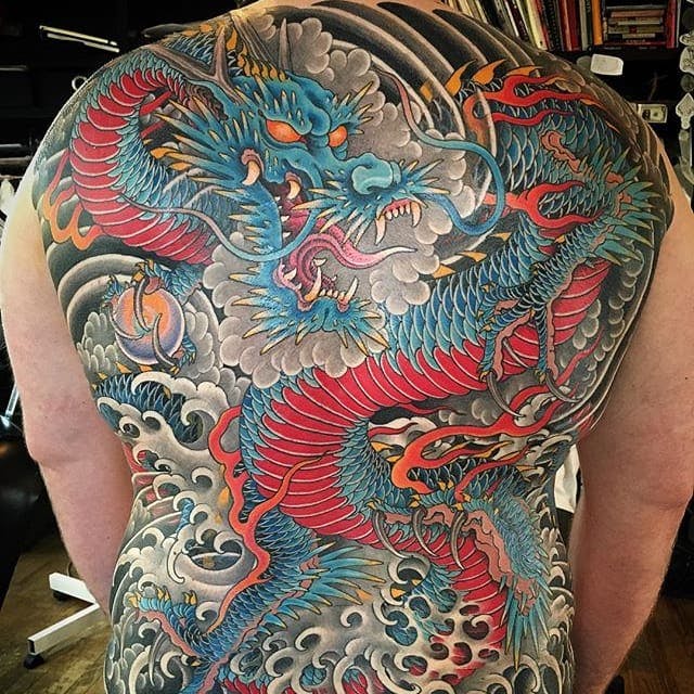 Blue and Red Dragon Full Back Tattoo Tattoo on skin