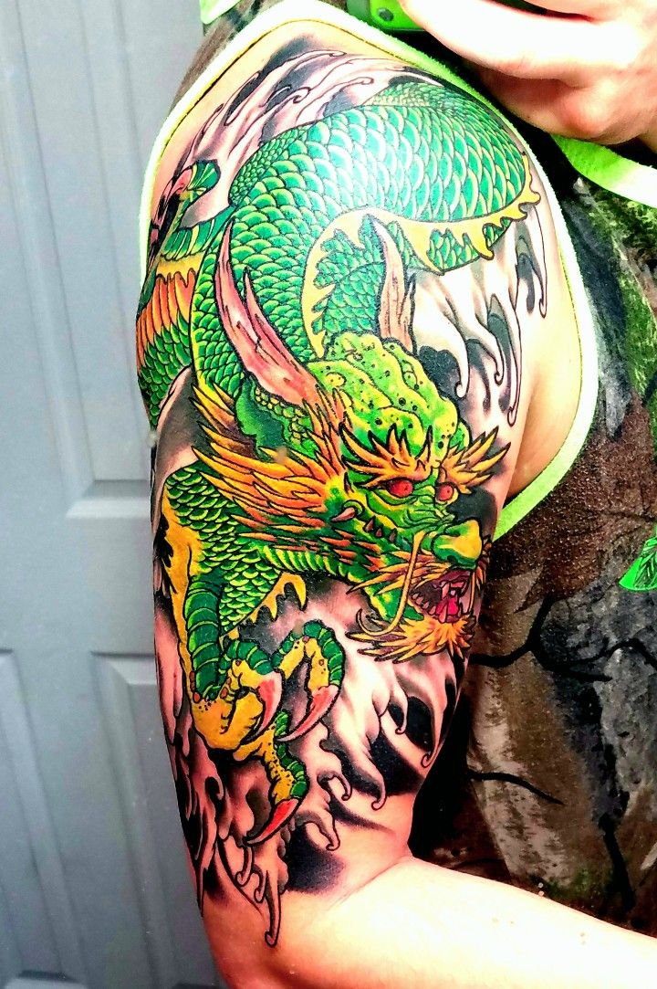 Bright Green Dragon Arm and Shoulder Tattoo Tattoo on skin
