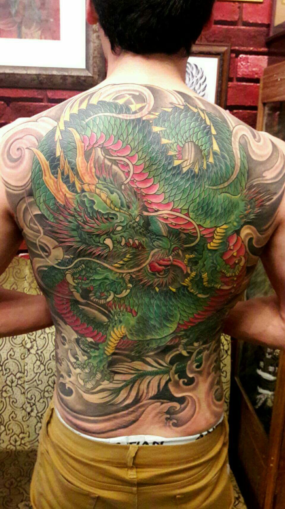 Colorful Mystic Dragon Full Back Tattoo Tattoo on skin