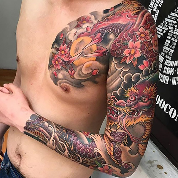 Floral Tattoo with Full Moon Tattoo on skin