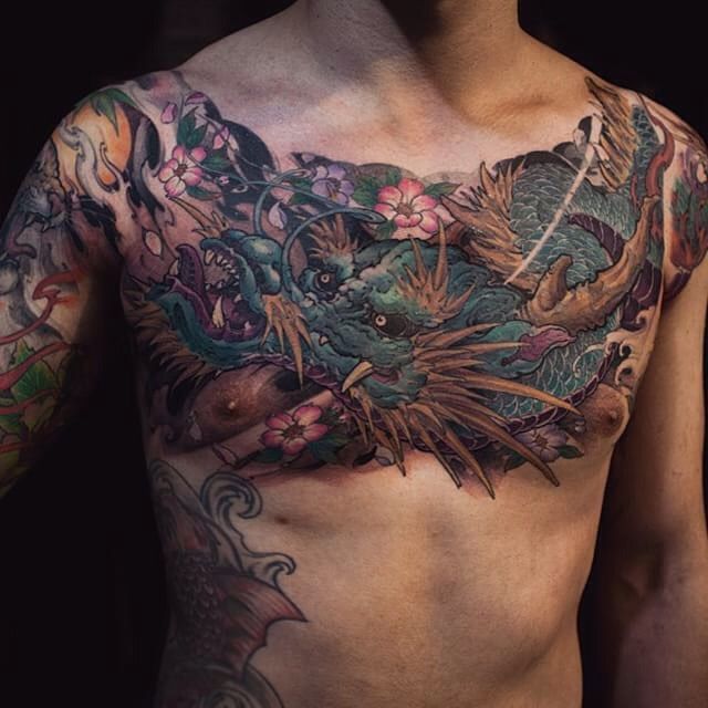 Large Floral Dragon Chest and Shoulders Tattoo Tattoo on skin