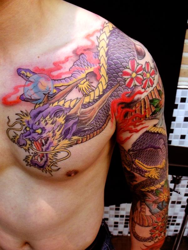Purple and Yellow Mythical Dragon Chest Tattoo Tattoo on skin