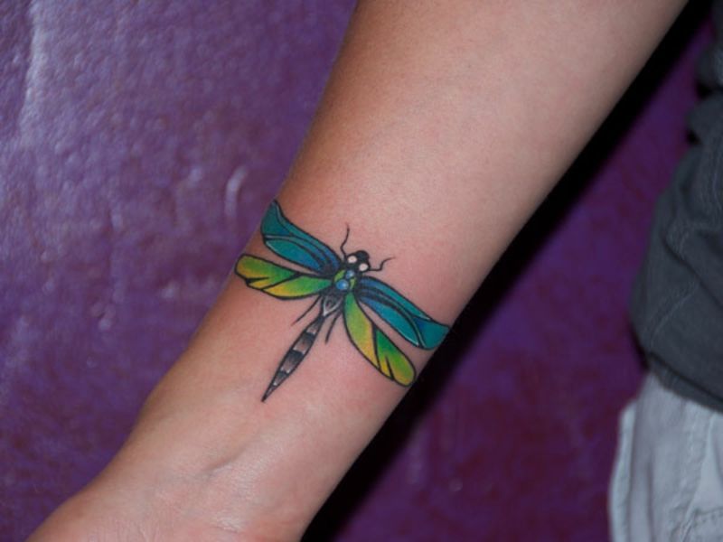 Small-Sized Bluish-Green Dragonfly Tattoo Design Tattoo on skin
