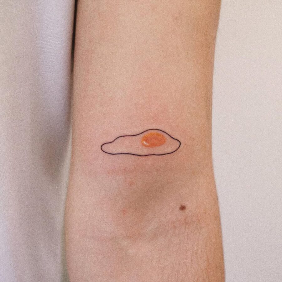 Charming and whimsical egg tattoo design concept Tattoo on skin