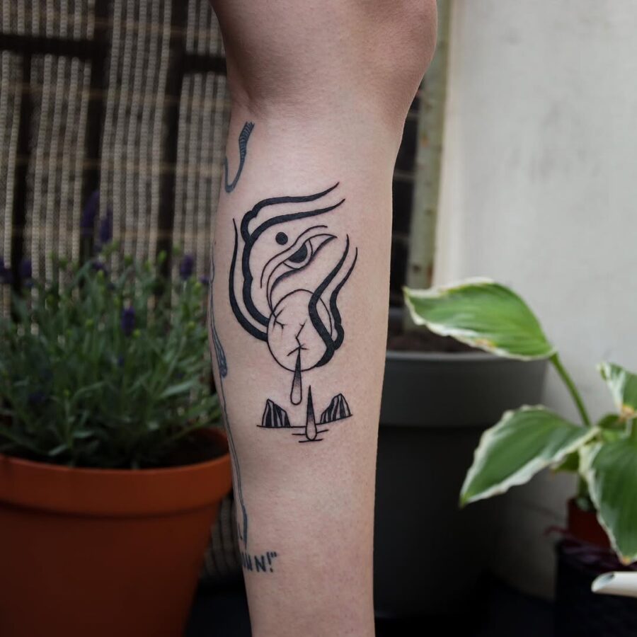 Unique abstract egg tattoo expressing femininity Tattoo on skin