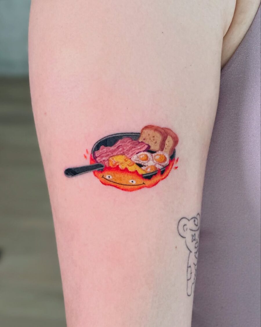 Vibrant Egg Tattoo with Breakfast Aesthetic Tattoo on skin