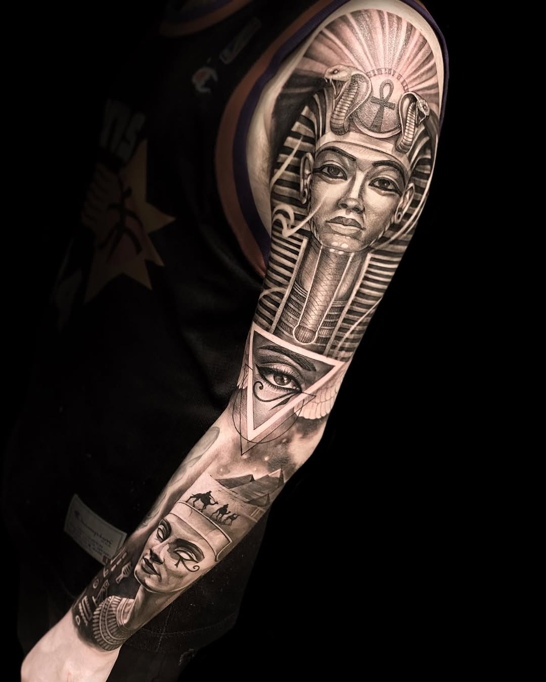 Elegant Egyptian symbols come to life in ink Tattoo on skin