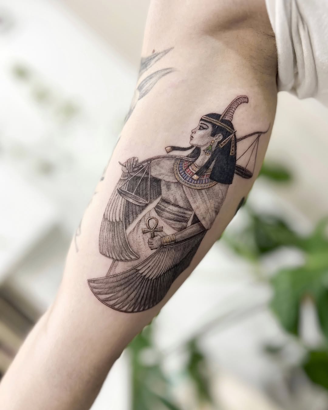 Elegant representation of the goddess Hathor tattoo Tattoo on skin